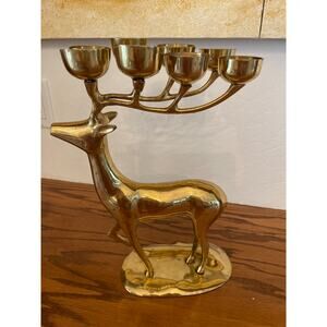 Vintage brass reindeer candle holder